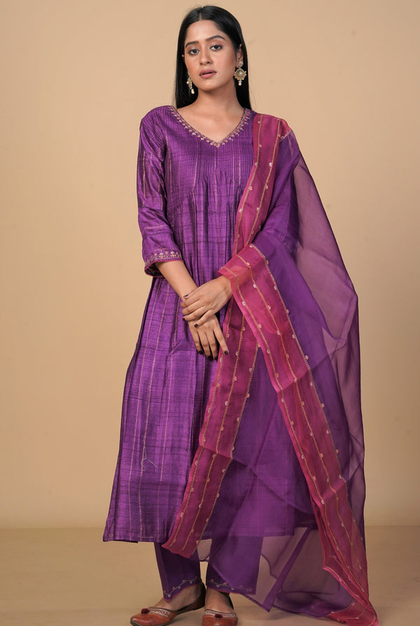 A women wearing purple pure tussar salwar suit, party wear for women