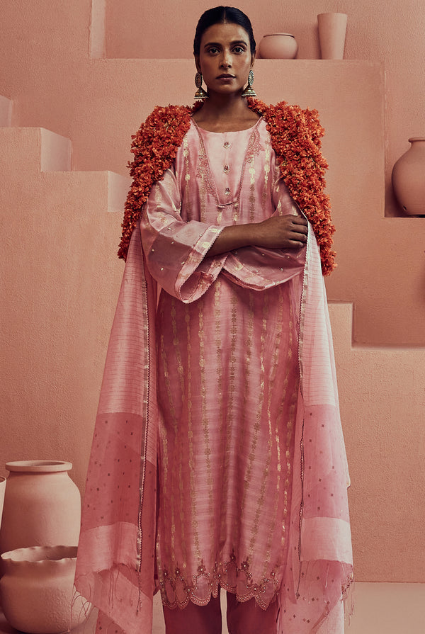 A women wearing pink pure fancy chanderi suit set with organza tikki dupatta, ethnic wear for women.