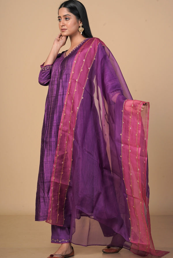 A women wearing purple pure tussar salwar suit, party wear for women