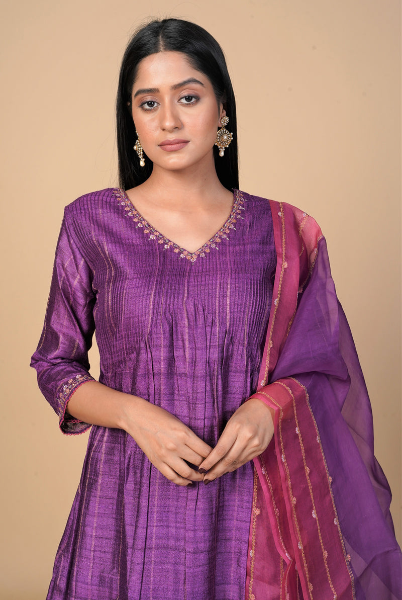 A women wearing purple pure tussar salwar suit, party wear for women