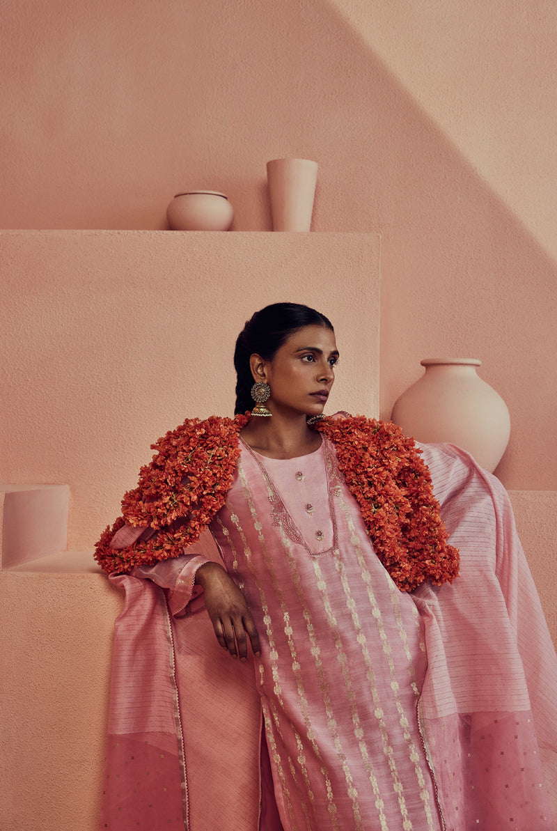A women wearing pink pure fancy chanderi suit set with organza tikki dupatta, ethnic wear for women.