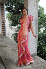 A woman wearing pure georgette hand dyed saree, latest saree, new saree collection
