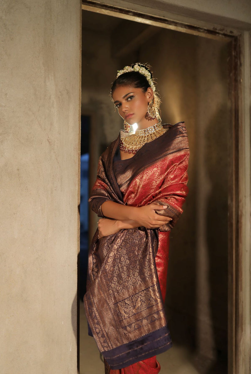 A woman wearing pure crepe crimson red saree, latest saree, new saree collection