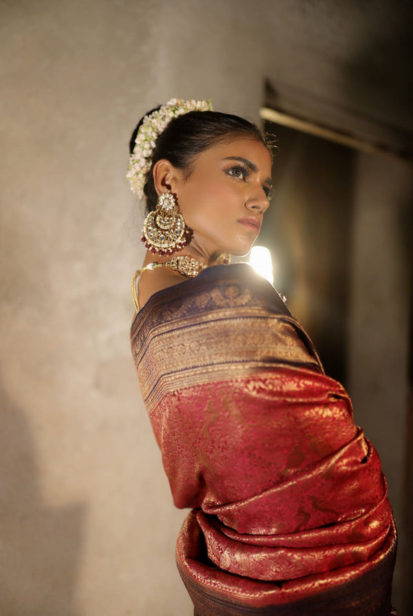 A woman wearing pure crepe crimson red saree, latest saree, new saree collection