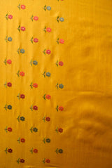A woman wearing mustard tussar resham embroidered saree, latest saree, new saree collection