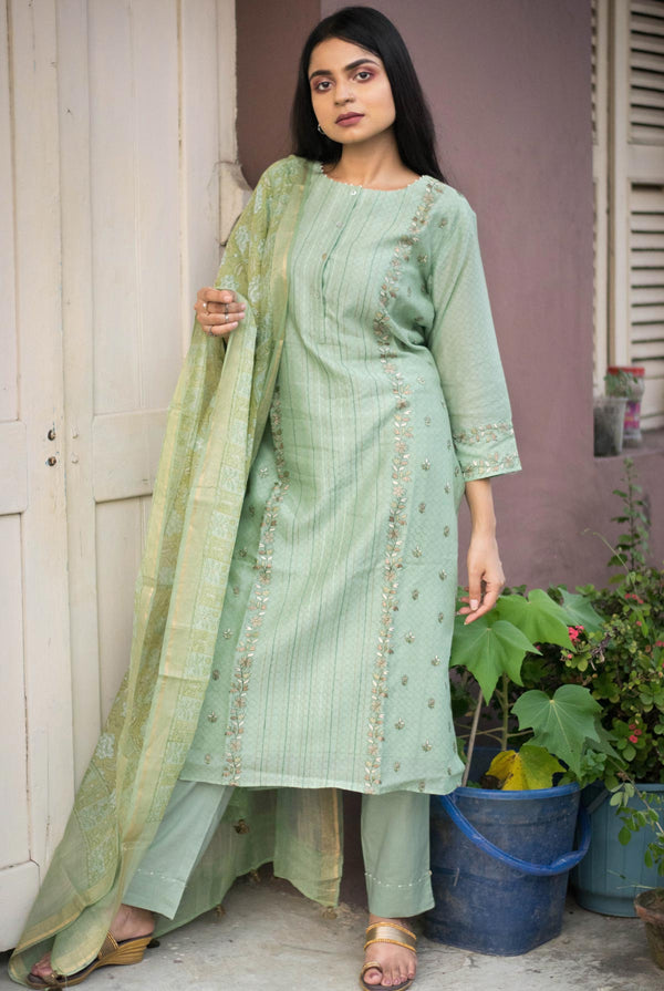A women wearing sea green chanderi salwar suit, ethnic wear for women