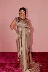 A woman wearing lilac pure crepe saree, latest saree, new saree collection