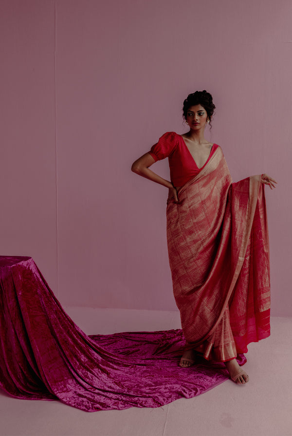 A woman wearing bright red pure crepe saree, latest saree, new saree collection