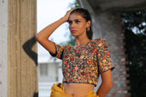 A woman wearing mustard pure tussar saree, latest saree, new saree collection