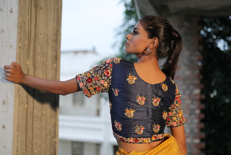 A woman wearing mustard pure tussar saree, latest saree, new saree collection